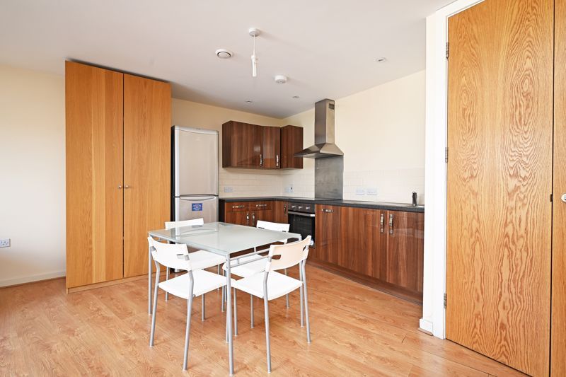 Property photo 3 of 10 Dining Area / Kitchen