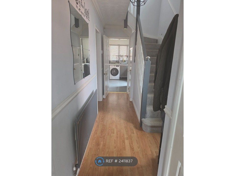 Property photo 2 of 12 Downstairs Hallway