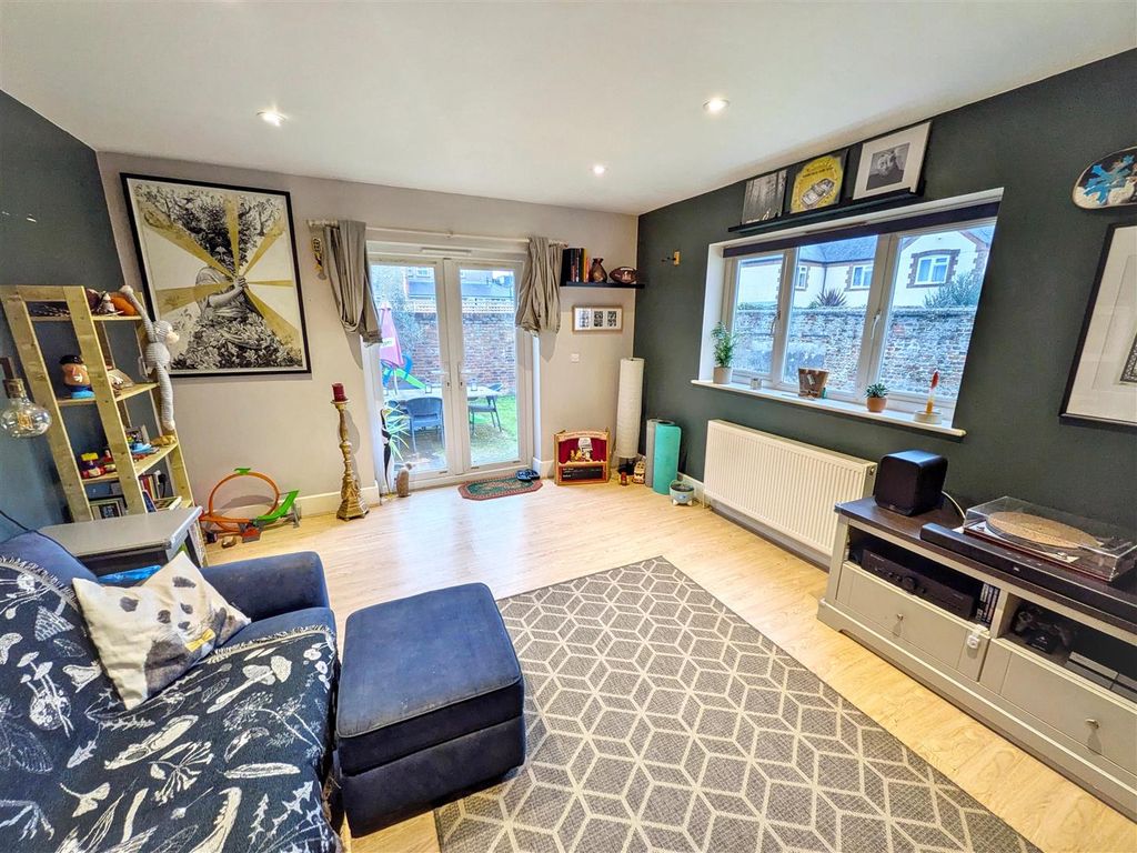 Property photo 3 of 12 Living Area