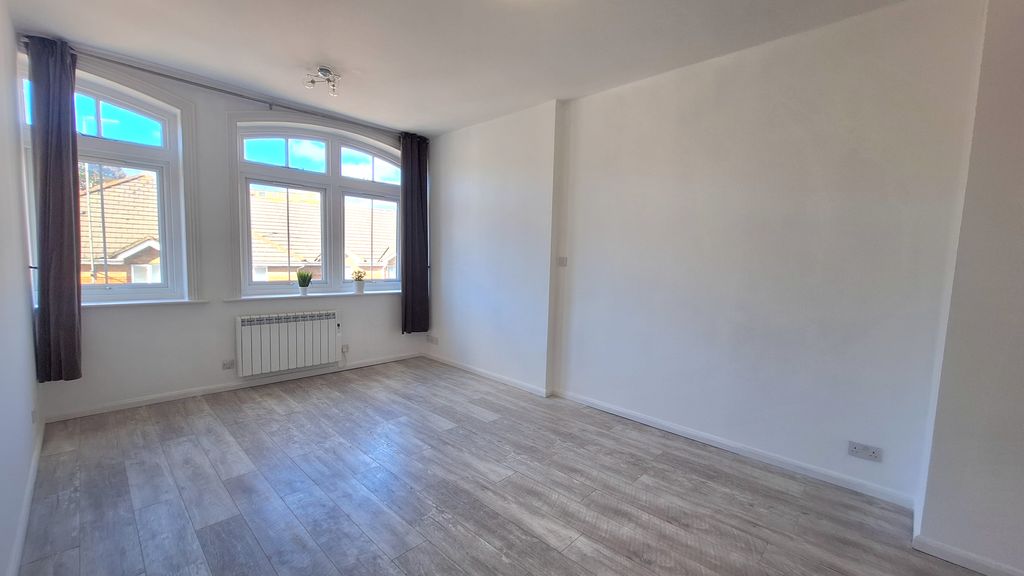 Property photo 3 of 8 Living Area