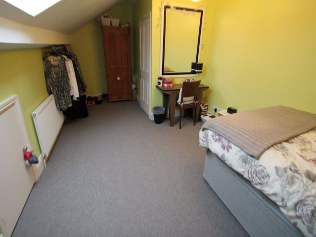 Property photo 3 of 20 A Well-Lit, Tidy Bedroom Featuring A Comfortable d...