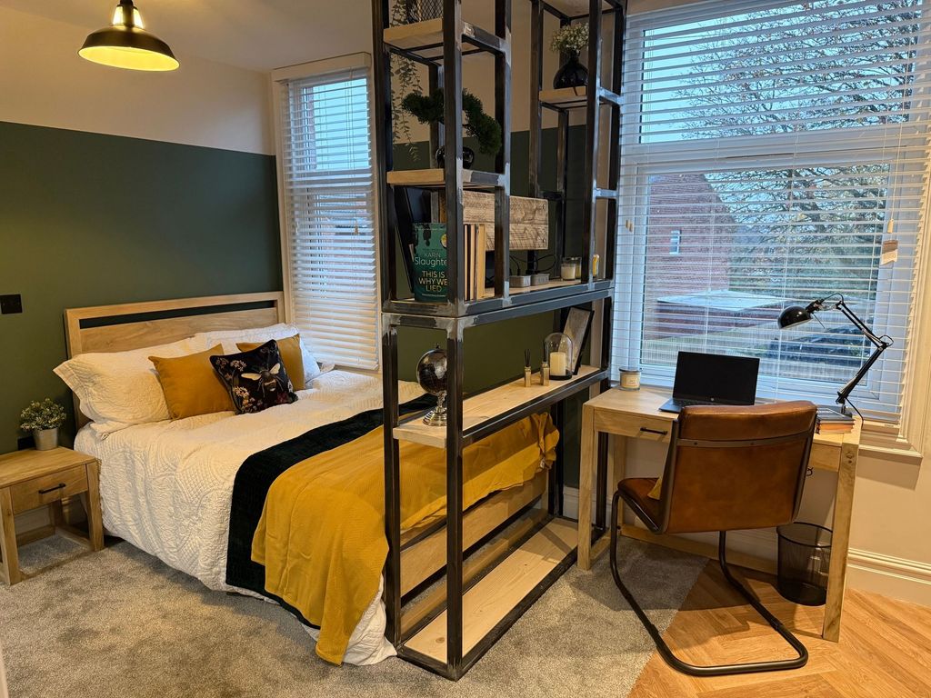 Property photo 1 of 5 Bright And Stylish Master Bedroom Featuring A Comf...