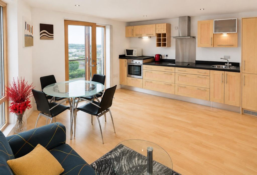 Property photo 3 of 6 Bright Open-Plan Kitchen And Dining Area...