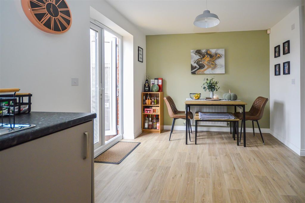 Property photo 3 of 11 Dining Kitchen