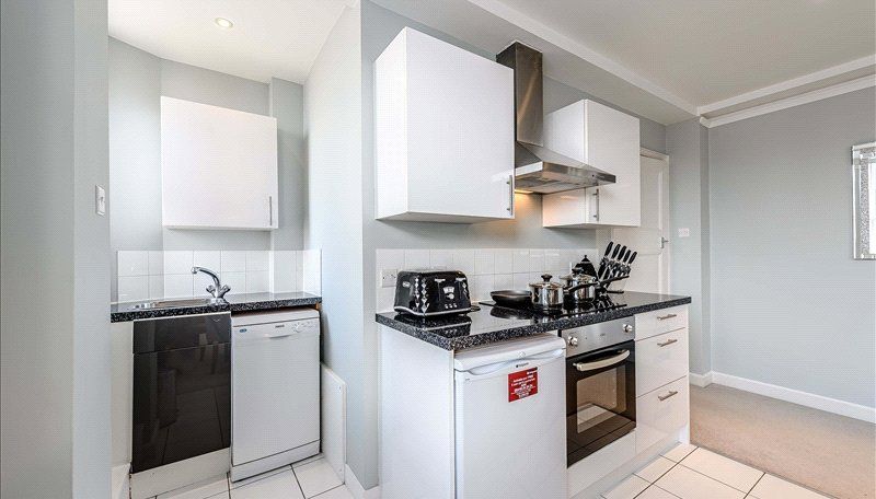 Property photo 3 of 8 Kitchen