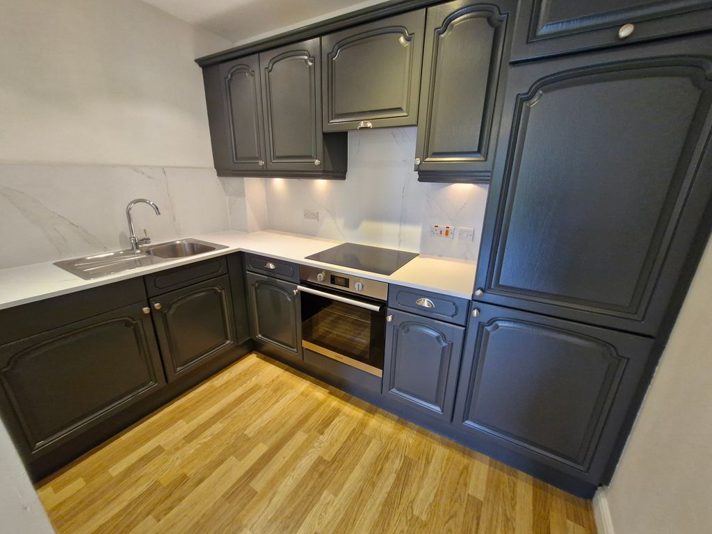 Property photo 3 of 6 Kitchen