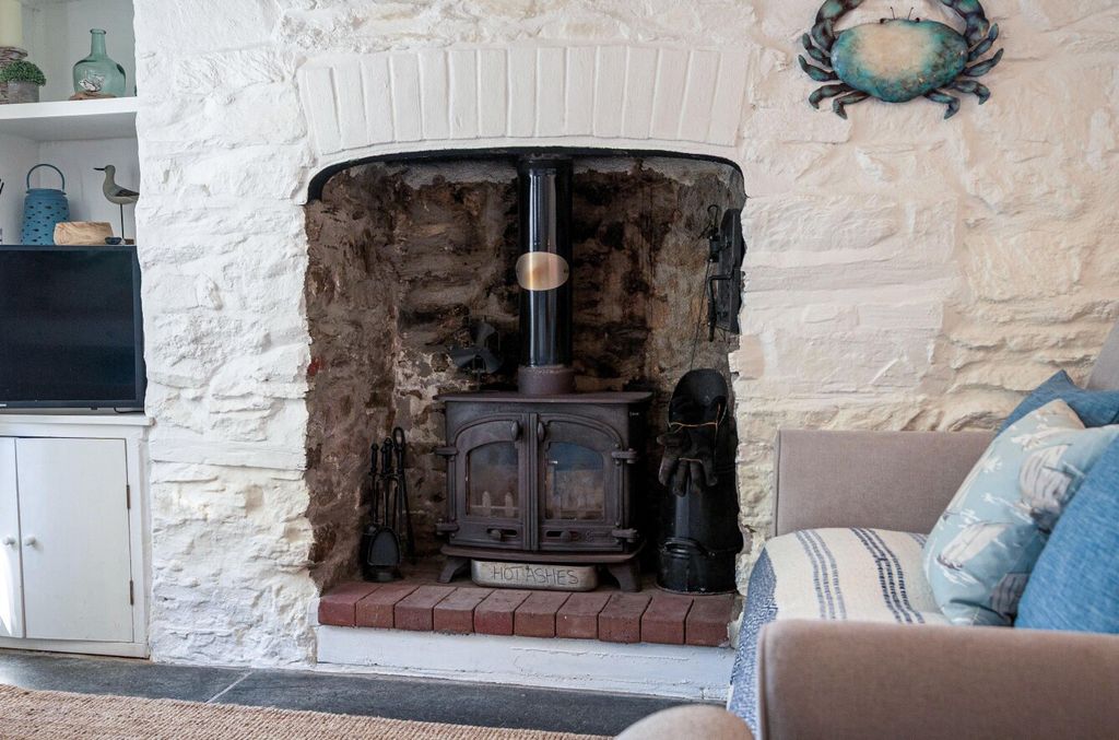 Property photo 3 of 8 Fireplace