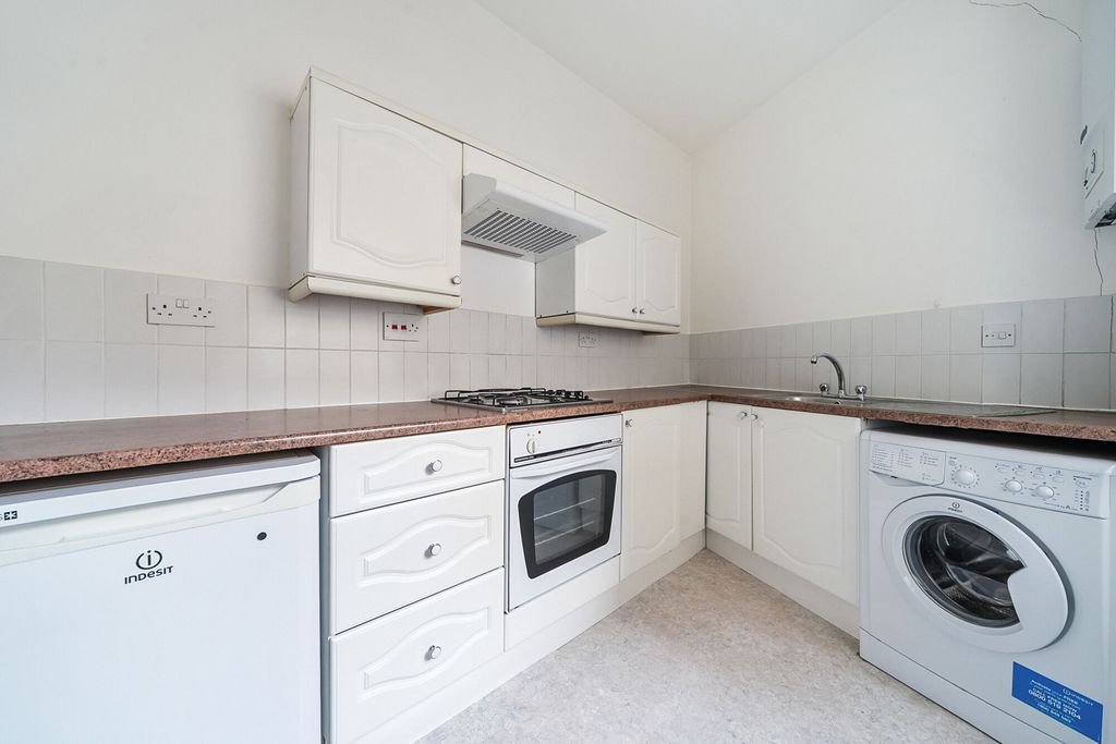 Property photo 2 of 12 Kitchen
