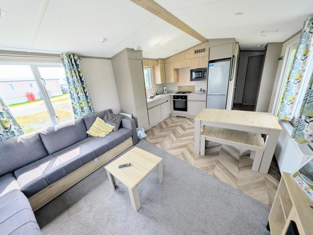 Property photo 2 of 10 Modern Open Plan Kitchen, Dining And Living Area With Integrated Appliances