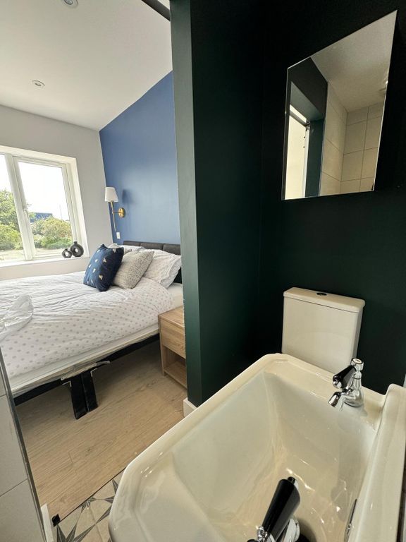 Property photo 3 of 5 Bathroom And Bedroom