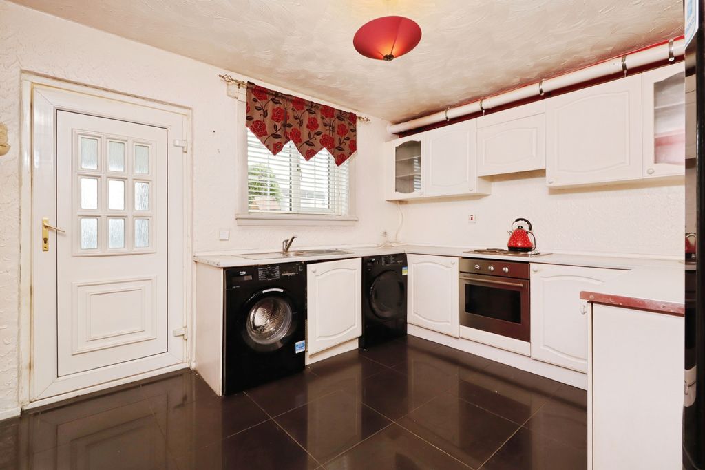 Property photo 3 of 13 Kitchen
