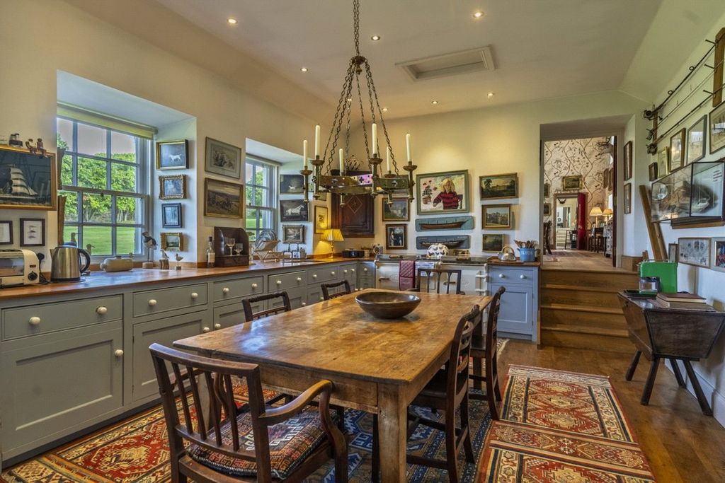 Property photo 3 of 16 Dining Kitchen