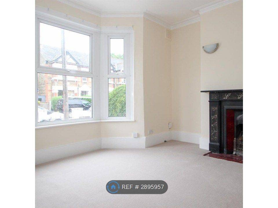 Property photo 3 of 8 Sitting Room