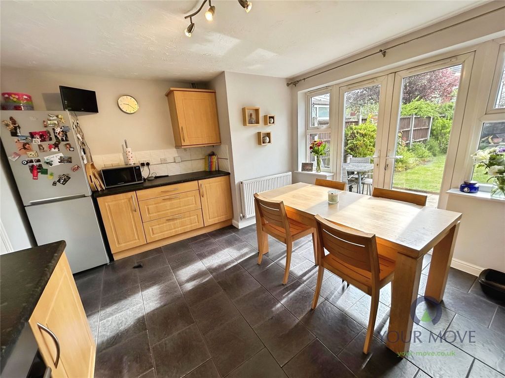 Property photo 3 of 16 Dining Kitchen