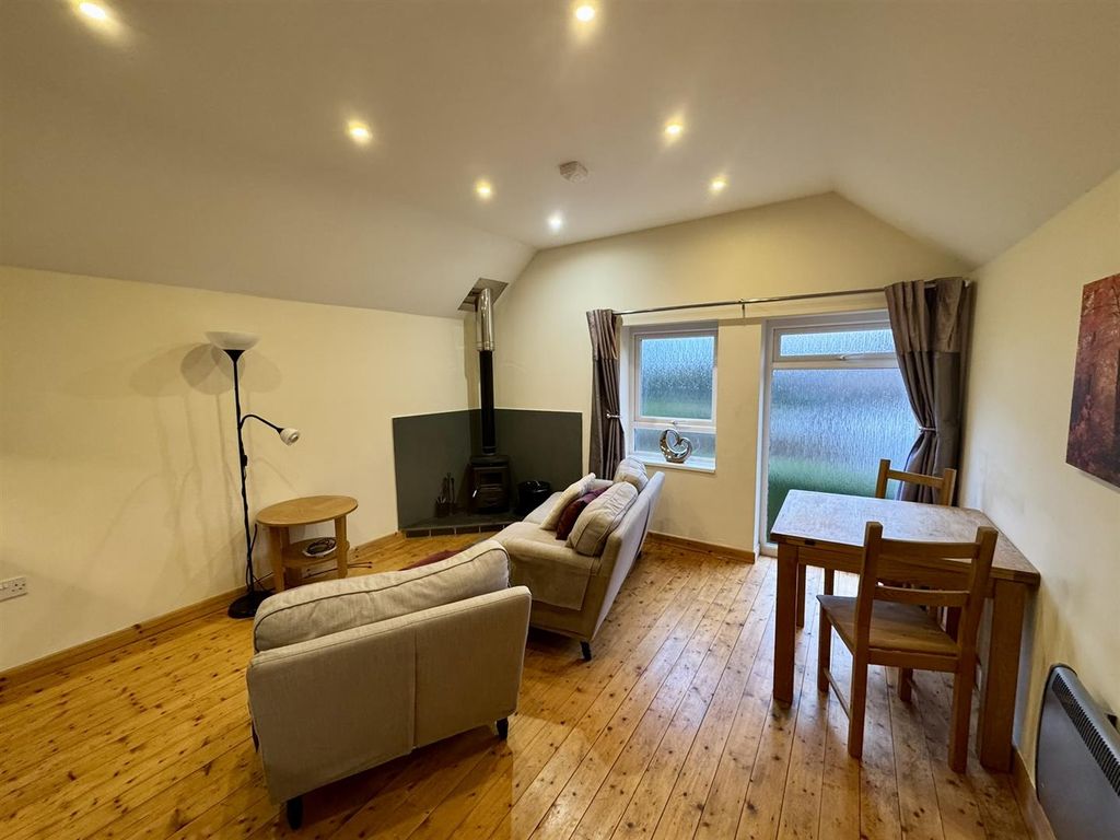 Property photo 3 of 9 Kitchen/Living/Dining