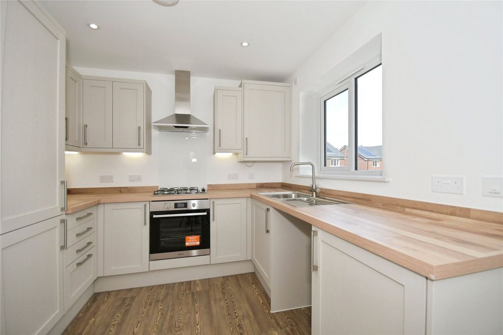Property photo 3 of 10 Typical Kitchen