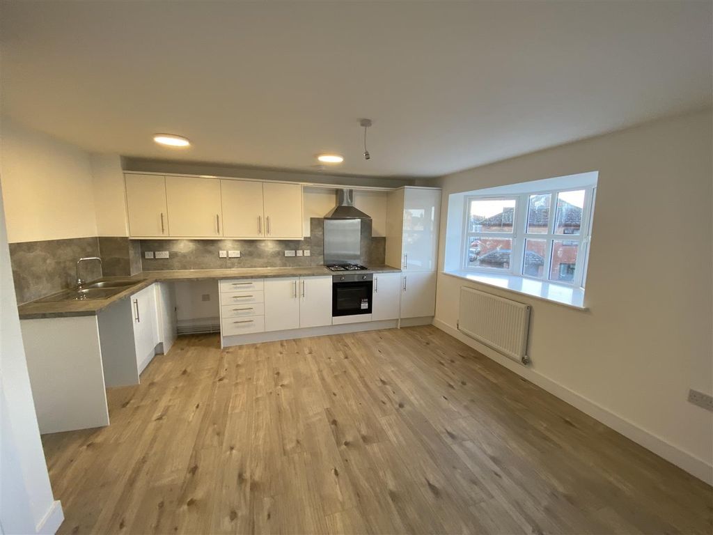 Property photo 2 of 7 Modern Bright Kitchen With Sleek White Cabinets...