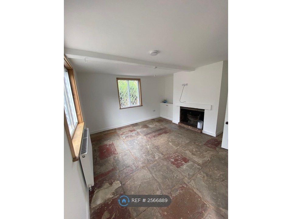 Property photo 3 of 10 Living Room (Front)