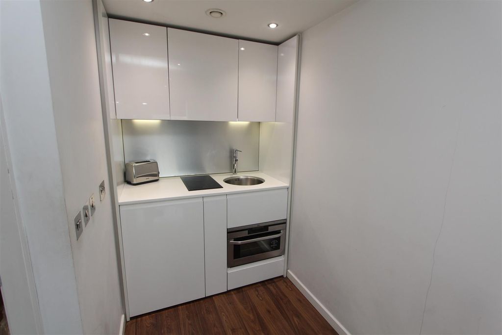 Property photo 2 of 7 Sleek Contemporary Kitchenette With High Gloss Fin...
