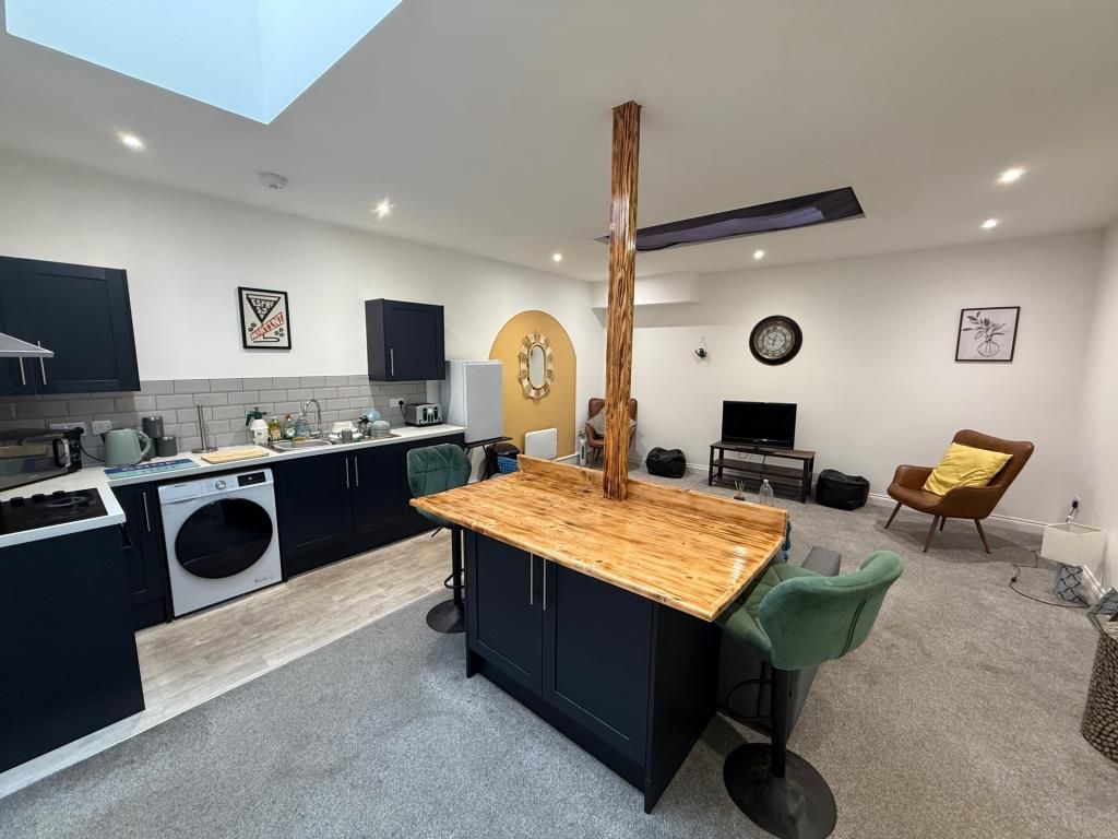 Property photo 2 of 8 Living Room And Kitchen