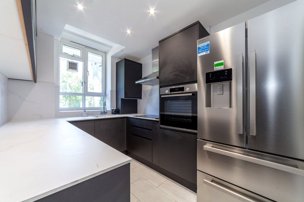 Property photo 2 of 11 Kitchen