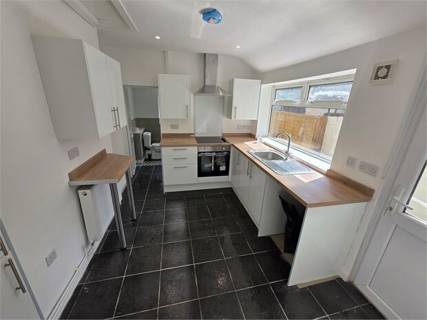 Property photo 2 of 12 Kitchen