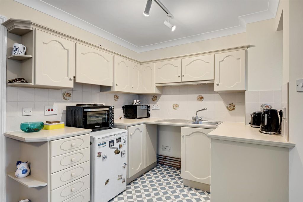 Property photo 3 of 12 Kitchen