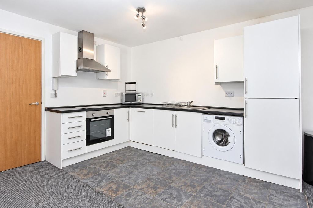 Property photo 2 of 9 Bright Kitchen With Sleek Modern Appliances...