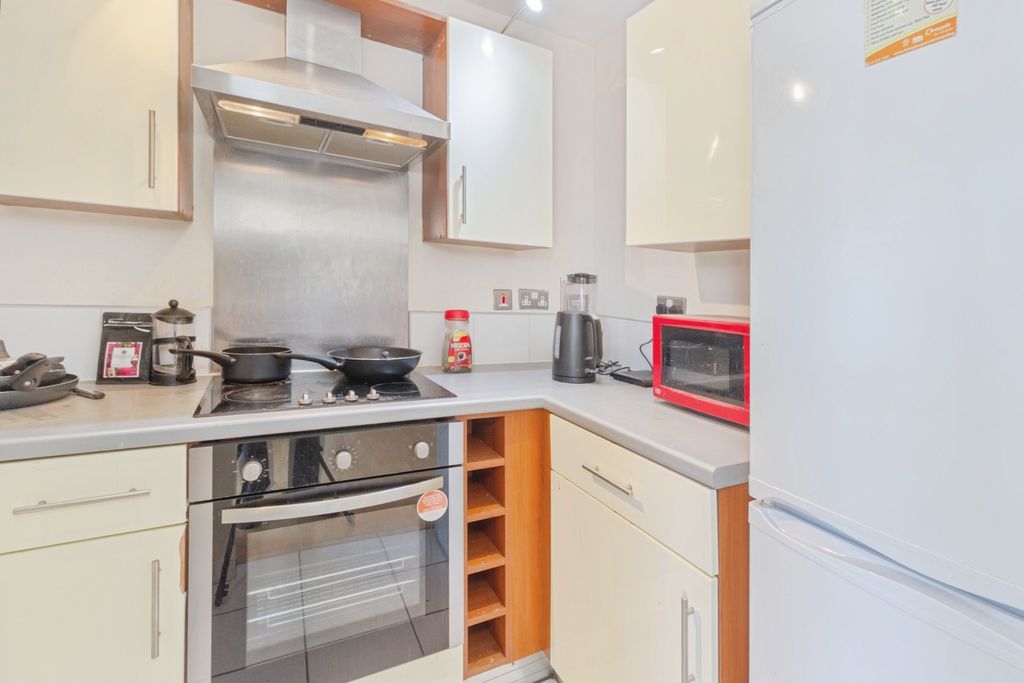 Property photo 3 of 12 Kitchen