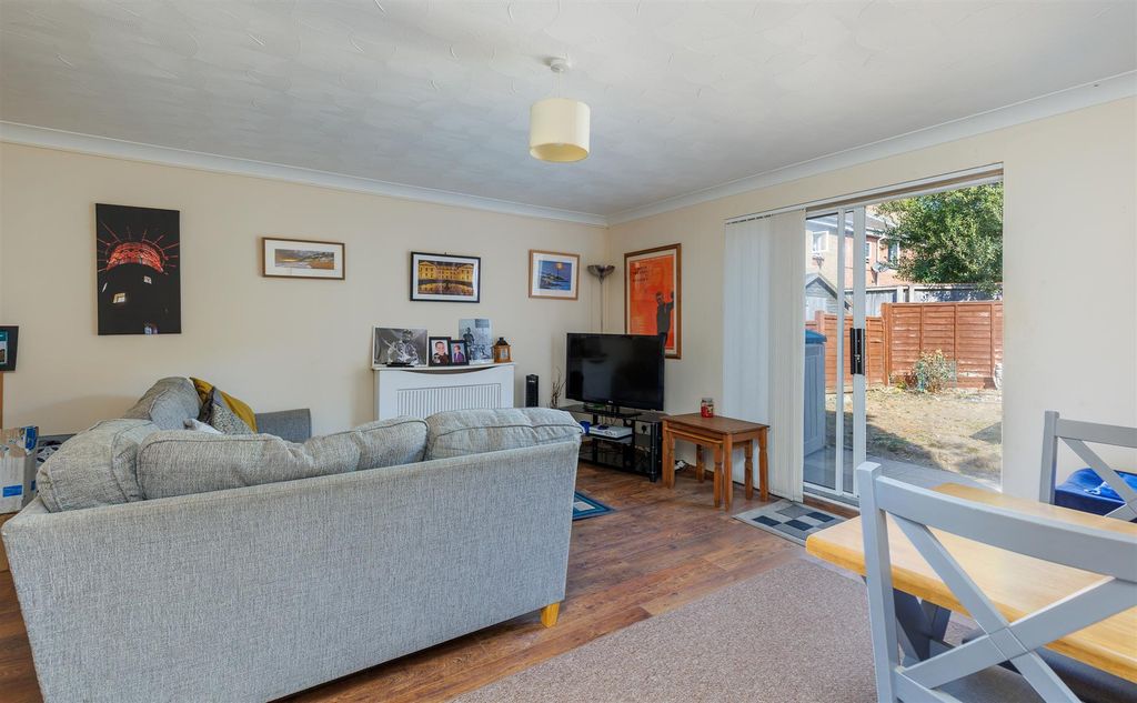 Property photo 2 of 19 Sitting Room With Doors To Garden