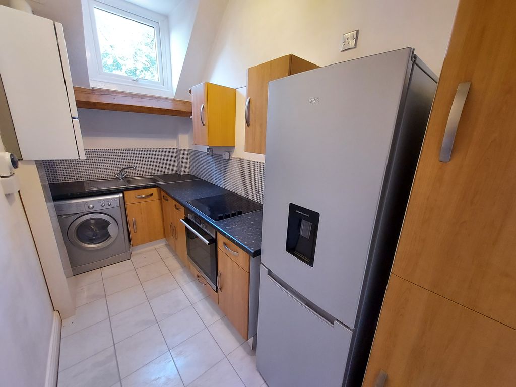 Property photo 3 of 7 Kitchen
