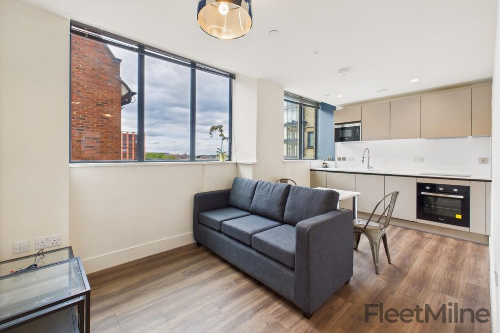Property photo 1 of 16 Living Area