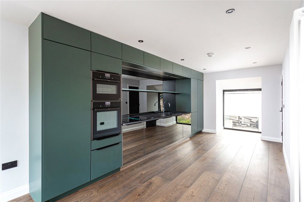 Property photo 2 of 13 Kitchen Area
