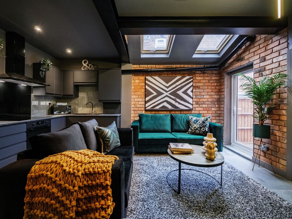 Property photo 3 of 14 Contemporary Living Room With Stylish Exposed Bric...