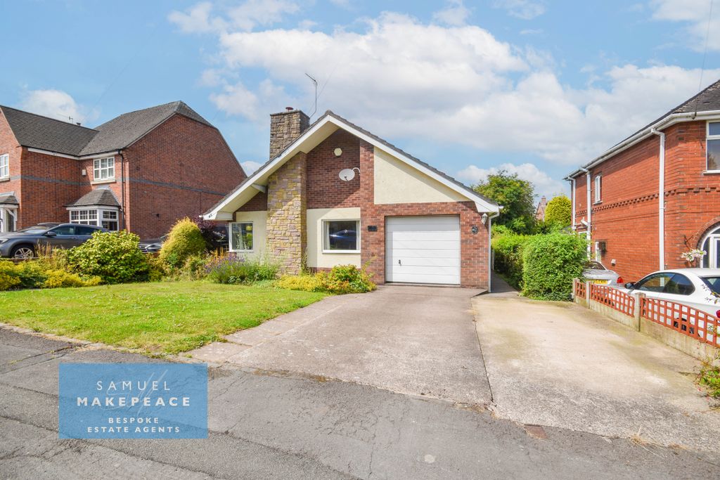 Property photo 1 of 25 Two Bedroom Detached Bungalow With Over-Sized Garage