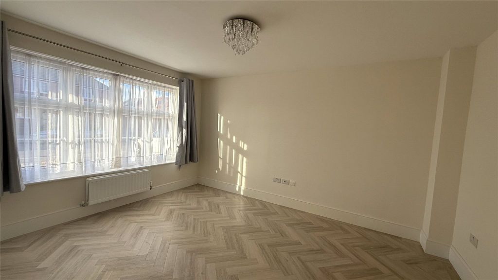 Property photo 3 of 34 Front Living Room