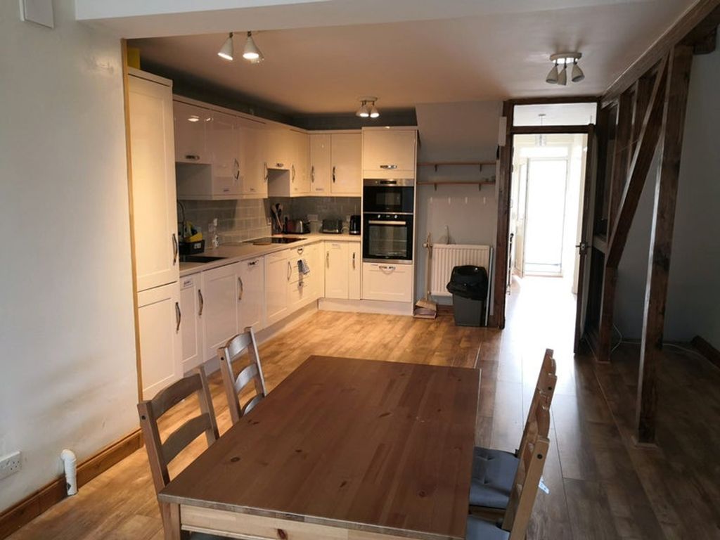 Property photo 2 of 7 A Bright And Spacious Kitchen Featuring Modern App...