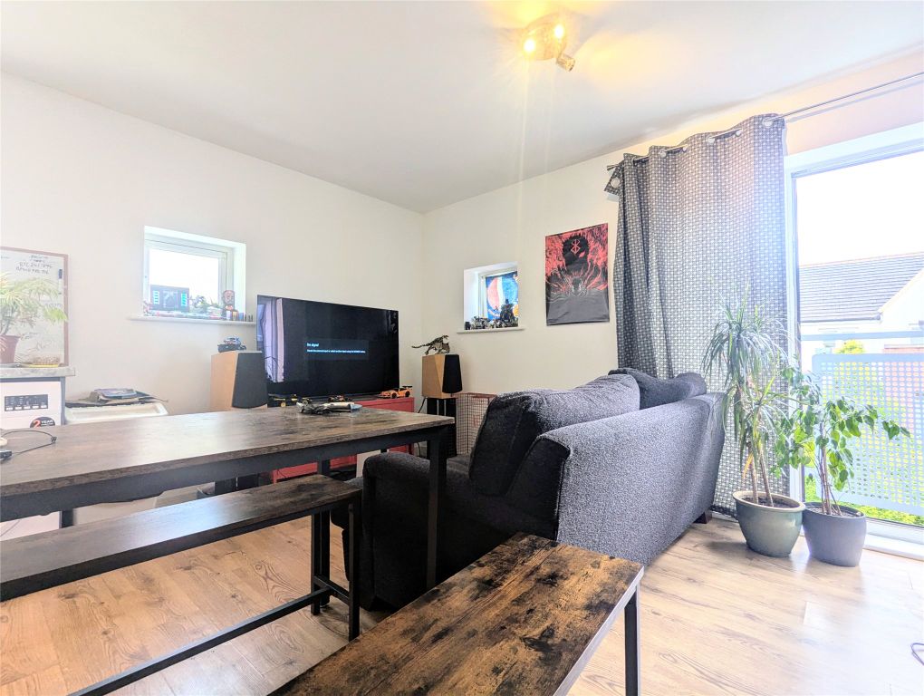 Property photo 1 of 6 Living Area