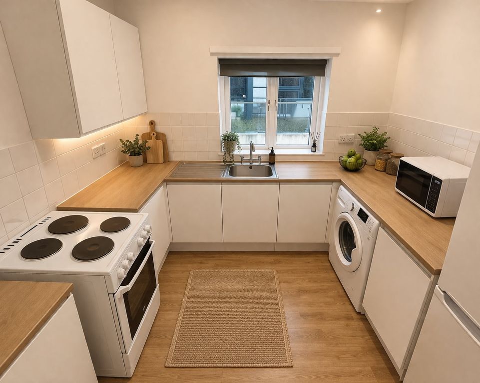 Property photo 3 of 6 Kitchen