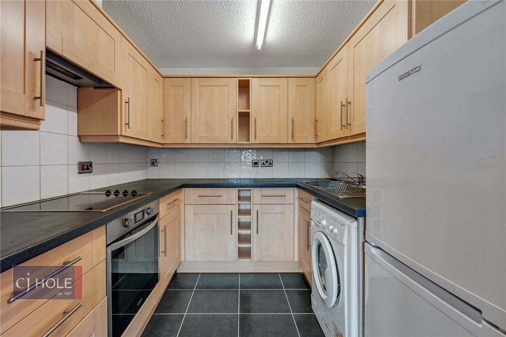 Property photo 2 of 8 Kitchen