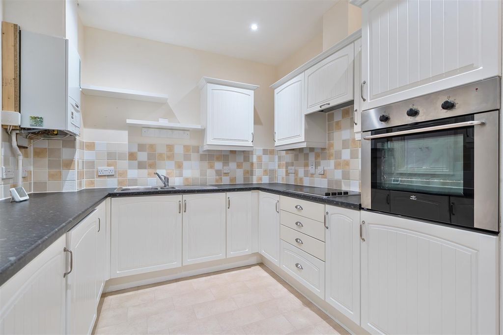 Property photo 2 of 12 Kitchen