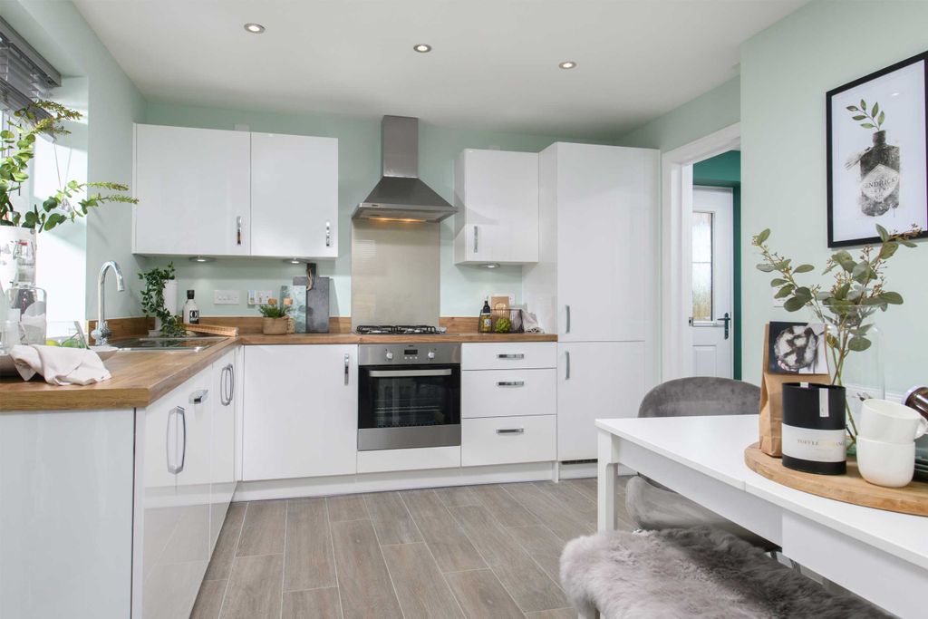 Property photo 3 of 10 David Wilson Homes Hadley Kitchen