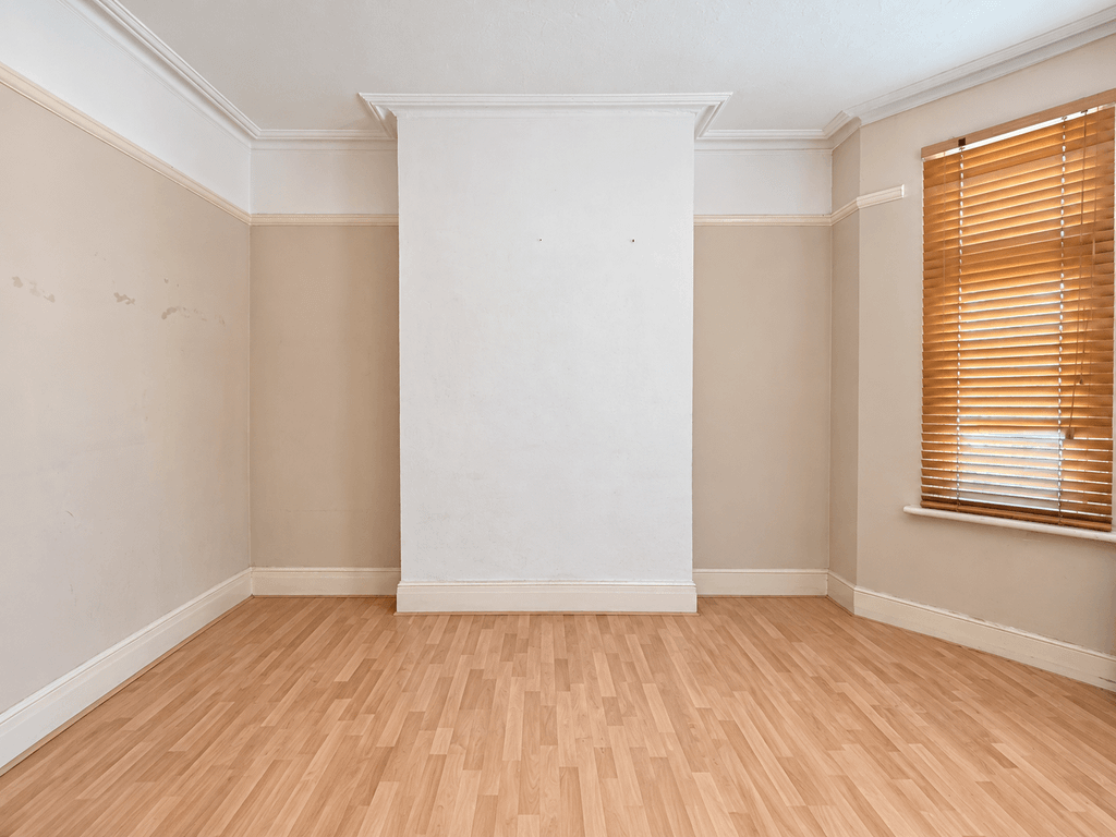 Property photo 3 of 14 Bright Empty Bedroom With Original Details Preserved