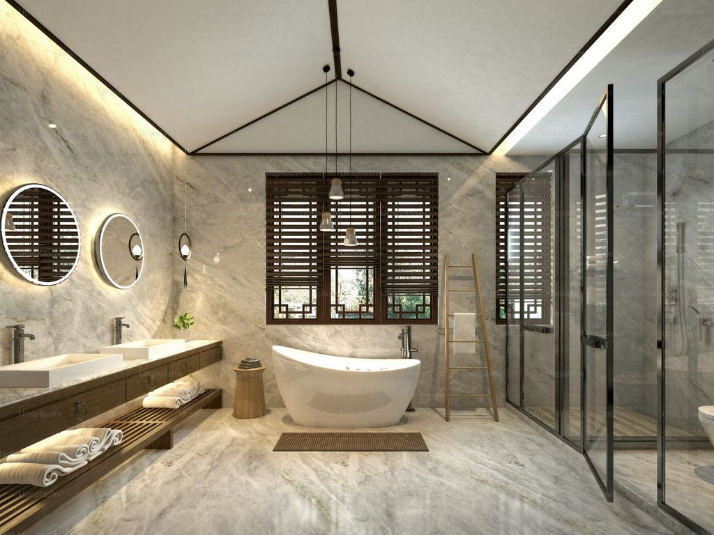 Property photo 2 of 5 A Spacious And Stylish Bathroom Featuring A Luxuri...