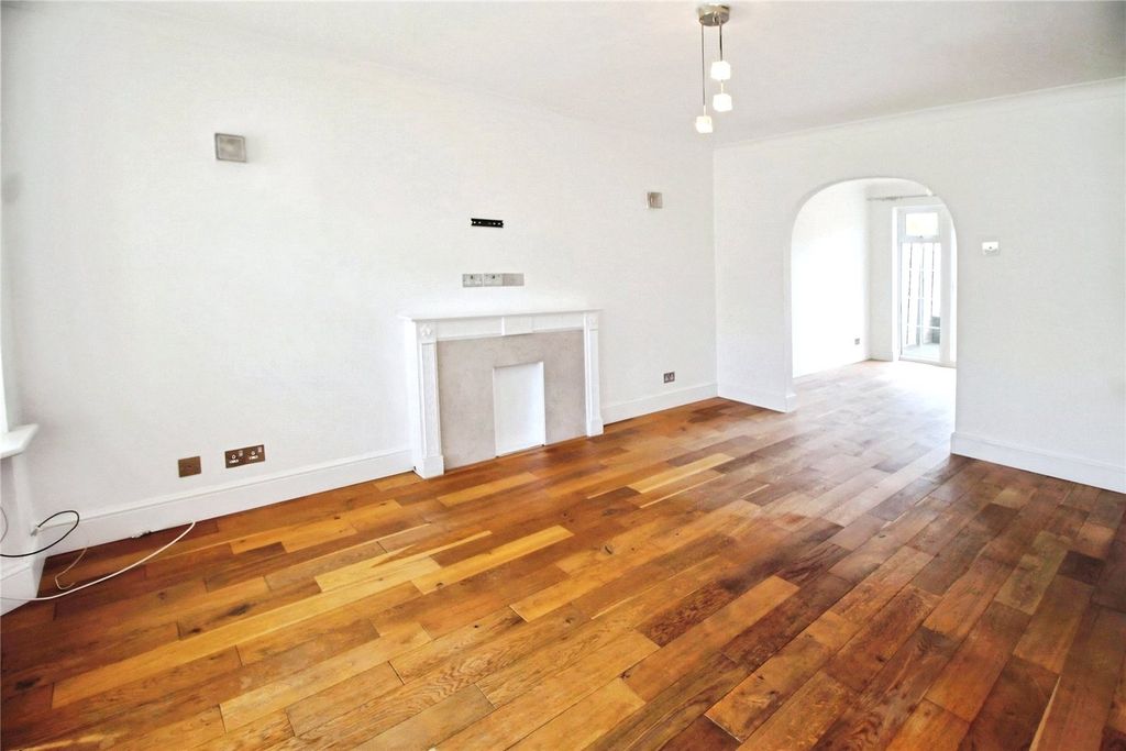 Property photo 3 of 13 Lounge Fireplace