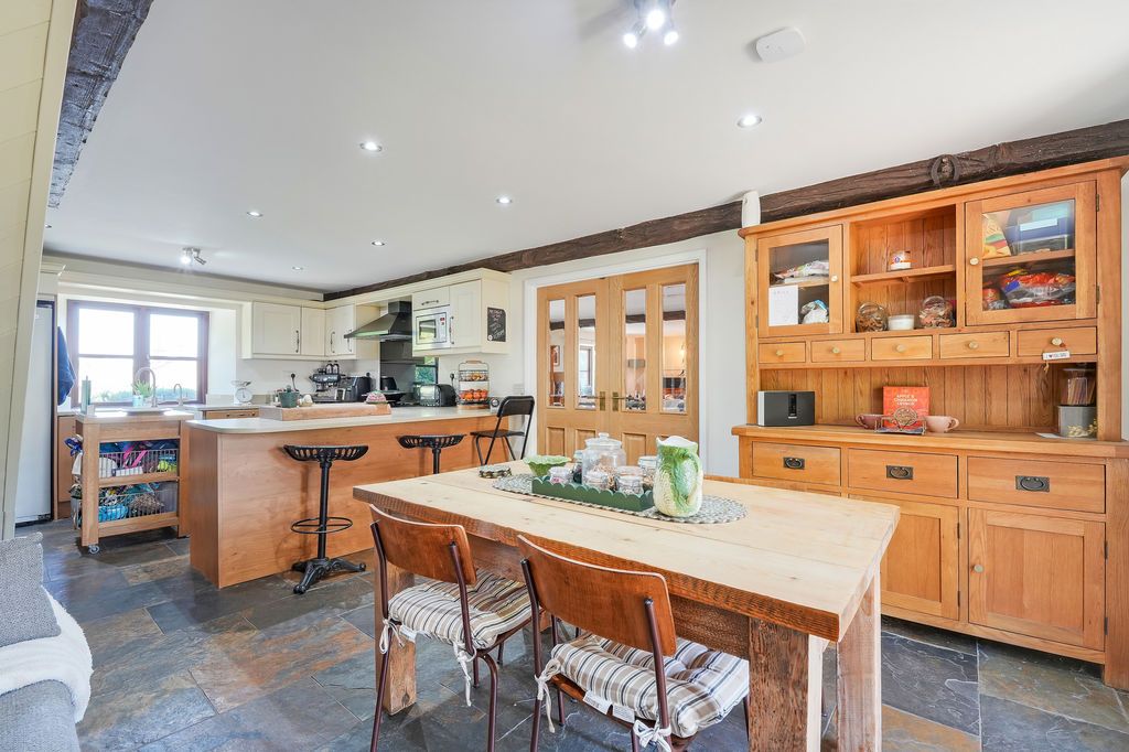 Property photo 3 of 44 Dining Kitchen