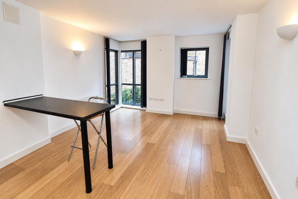Property photo 3 of 9 Bright Modern Living Area With Wooden Floors...