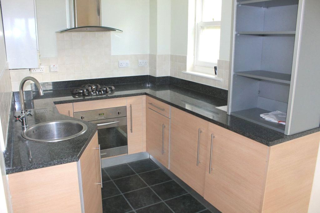 Property photo 3 of 9 Kitchen