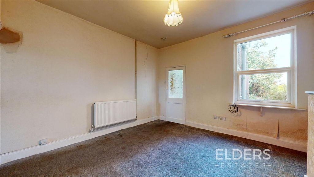 Property photo 3 of 12 Dining Room
