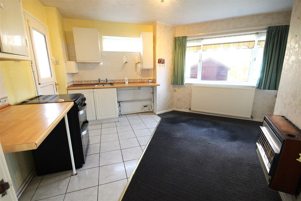 Property photo 2 of 24 Dining Kitchen